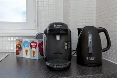 a coffee maker sitting on top of a counter at Super Prime Park View Duloch by TBA in Dunfermline