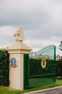 a statue of a horse on top of a gate at Ingliston Country Club Hotel in Bishopton