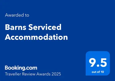 a blue sign that reads banks serviced accommodation at Barns Serviced Accommodation in Ayr