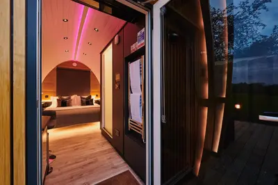 a room with a view of a bedroom with a bed at Luxury Hideaways in Keilour