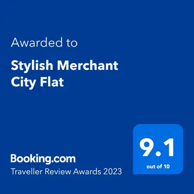 a blue screen with the text awarded to sykrit merchant city flat at Stylish Merchant City Flat in Glasgow