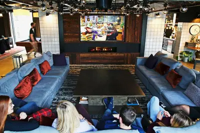 a group of people sitting on couches in a room at JOIVY at VITA Fountainbridge - Adults only - Breakfast buffet in Edinburgh
