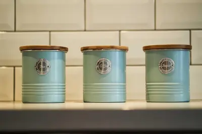 three blue cups sitting on a shelf in a kitchen at Thornhill Lodge, Historic 4 Bed, 4 Ensuite in Stirling