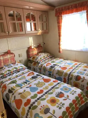 two beds in a small room with at Lyndhurst 28 in Dunoon