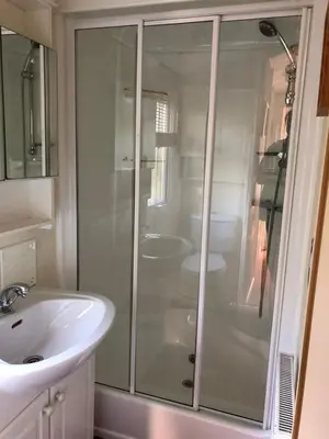 a bathroom with a shower and a sink at Lyndhurst 28 in Dunoon