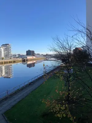 a view of a body of water with a tree at ArcView - SEC Hydro Two Bed Flat With Free parking and Great View in Glasgow