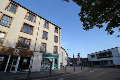 a building on the side of a city street at Six Stevenson House, Oban in Oban