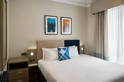 a hotel room with a bed and a window at Four Points Flex by Sheraton Edinburgh in Edinburgh