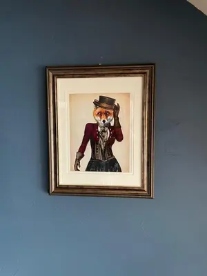 a picture of a cat wearing a top hat at The Coylet Inn by Loch Eck in Dunoon