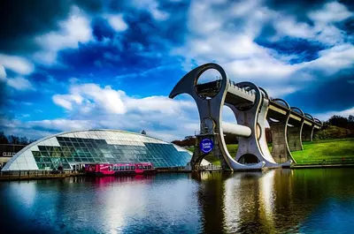 a view of a large building and a building in the water at Ginger's in Stirling