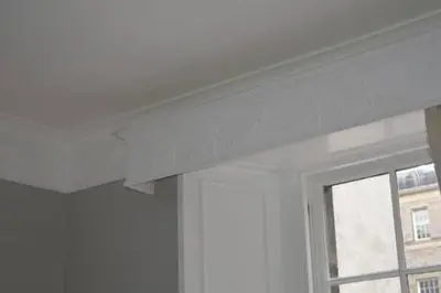 a white room with a window and a white ceiling at castle Apartment 1 in Edinburgh
