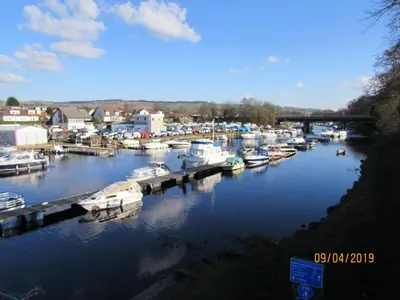 a group of boats docked in a marina at Levenhowe Holiday Apartment in Balloch