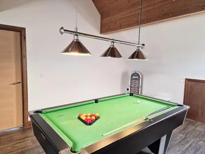 a pool table with a bowl of balls on it at Lbtie Lodge with Two Private Hot Tubs - Fife - Loch Leven - Lomond Hills in Kelty