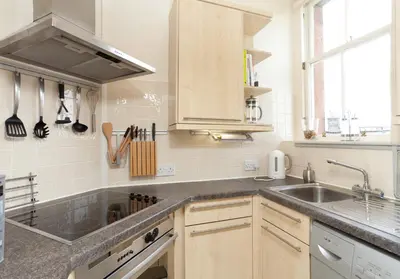 a kitchen with a sink and a counter top at Mardale Crescent - 380 in Edinburgh