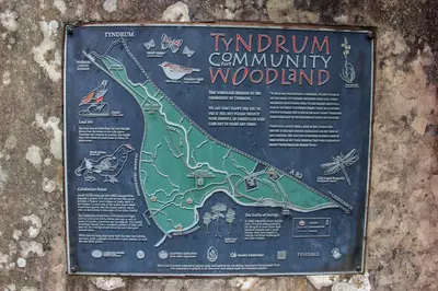 a sign is attached to a wall at Trekker Hut in Tyndrum