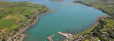 an aerial view of a river and a lake at Argyll Arms Hotel in Campbeltown