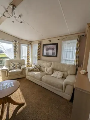 a living room with a couch and two couches at The Ashcroft Sea View 6 in Dunoon