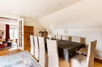 a dining room with a table and chairs at Luxury Duplex - Sleeps 2 - Hot Tub - Parking in Glenfarg
