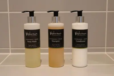 three bottles of hair products sitting on a bathroom counter at Tigh an Truish Inn in Oban