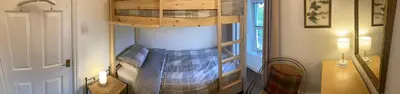 a bedroom with a bunk bed in a room at Park side Cottage, Number 2, The Morays in Blackford
