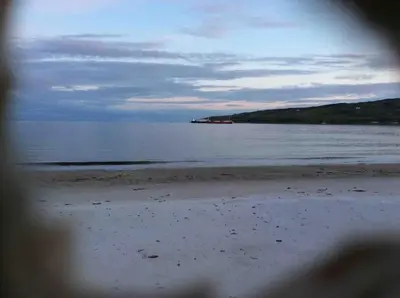 a view of a beach with the ocean at Upper Imeraval Cottage Sleeps 6 Pet-Friendly in Port Ellen