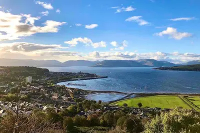a view of a body of water with a town at The Warwick Apartment in Greenock