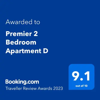 a screenshot of a phone with the text upgraded to premier bedroom apartment d at Premier Apartment D in Broxburn