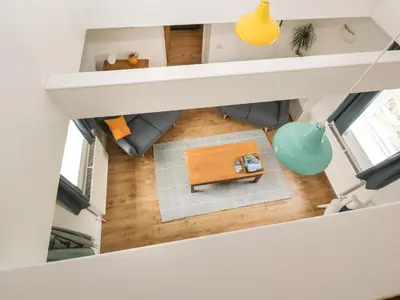 an overhead view of the living room of a tiny house at Ellanderroch in Glasgow