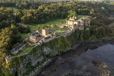 an aerial view of a castle on a cliff at Royal Artillery Cottage - Culzean Castle in Maybole
