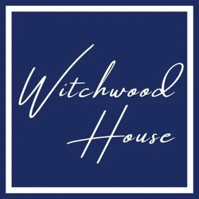 a blue sign with the words viet improved house at Witchwood House in Oban