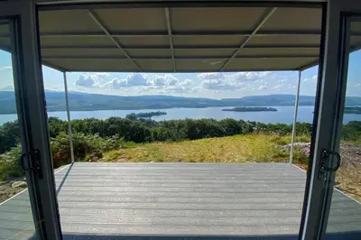 a view from the front door of a house at Columba Lodge, St Conan's Escape, Idyllic highland getaway in Dalmally