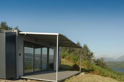 a house on top of a hill with a view at Columba Lodge, St Conan's Escape, Idyllic highland getaway in Dalmally
