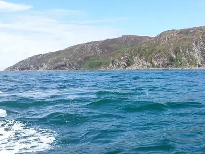 a large body of water with a mountain in the background at Ar Deireadh in Tayvallich