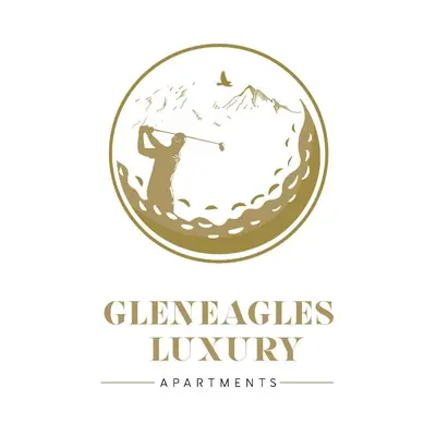 a man playing golf in a circle with a mountain in the background at Gleneagles Luxury Apartments in Auchterarder