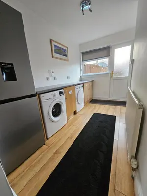 a laundry room with a washer and dryer at ALLARDYCE in Kincardine