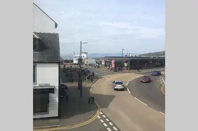 a busy city street with cars on the road at Ferry View in Largs