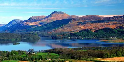 a view of a lake in front of mountains at Braeside Guest House, Loch Lomond in Drymen