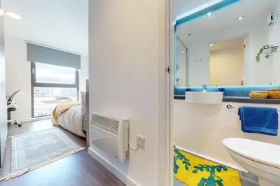 a bathroom with a sink and a toilet at Canvas Glasgow in Glasgow