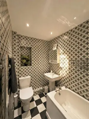 a bathroom with a toilet and a sink and a tub at Dreghorn House 5 b-rooms 9 beds 3 toilets 2 showers,1 bath 2 receiption Secure free Parking 233 Wifi in Edinburgh