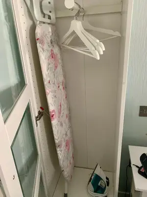 a room with a curtain hanging from a door at Lochindaal Hotel in Port Charlotte