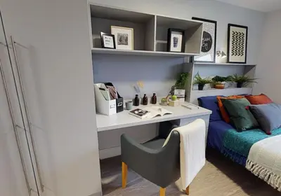 a bedroom with a desk and a bed at iQ Grove Accomodation in Edinburgh in Edinburgh