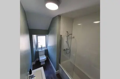 a bathroom with a shower and a sink at No7 Oban Harbour in Oban