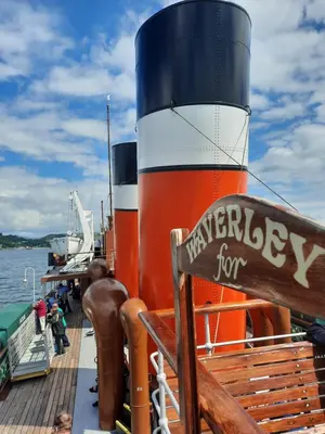a boat with a sign that reads therapy for at Firthview House in Kirn