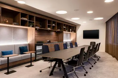 a conference room with a table and chairs at Courtyard by Marriott Glasgow SEC in Glasgow