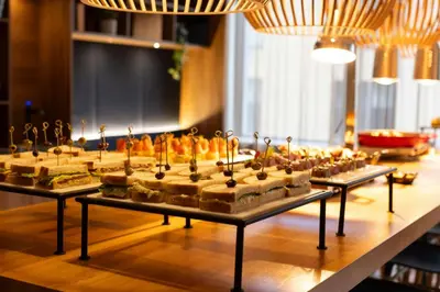 a buffet of food on display on a table at Courtyard by Marriott Glasgow SEC in Glasgow