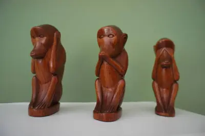 a group of wooden figurines sitting on a table at 17 William Street in Helensburgh