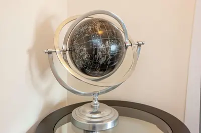 a silver globe on top of a table at Island View in Oban