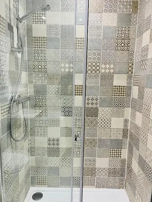 a bathroom with a shower with a glass door at Glasgow City Central Executive Triplex House, 3 Bedroom 3 Bathrooms 1 living room Kitchen - Huge Terrace for Master Bedroom - Private E Parking LEZ Congestion Zone Free - Garden - 5 mins drive to City Centre Central Station in Glasgow
