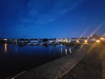 a view of a river at night at Ashley Cottage in Bowmore