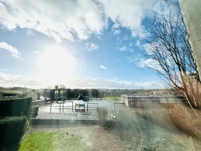a view of a park with a playground at Tillicoultry Jupiter Apartment - Scotland Holiday Let in Tillicoultry